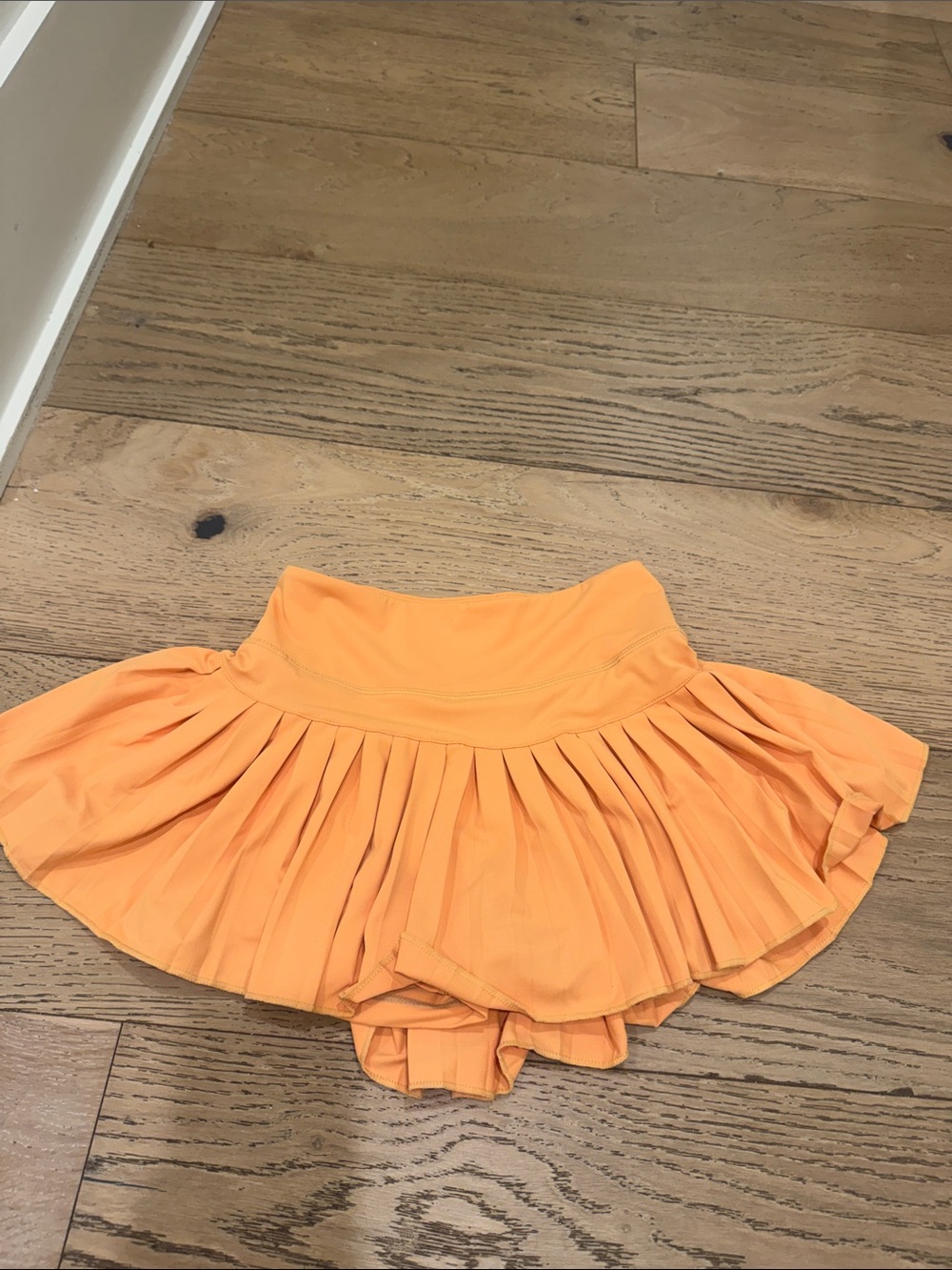 Pleated Active Skort in Bright Orange